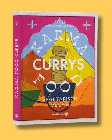 Kochbuch "Karma Food Currys – Vegetarisch & Vegan" mit buntem Cover und Dabba-Box-Illustration