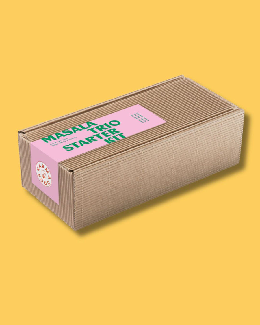 Verpacktes Masala Trio Starter Kit von Karma Food in umweltfreundlicher Kartonbox mit rosa-grünem Etikett